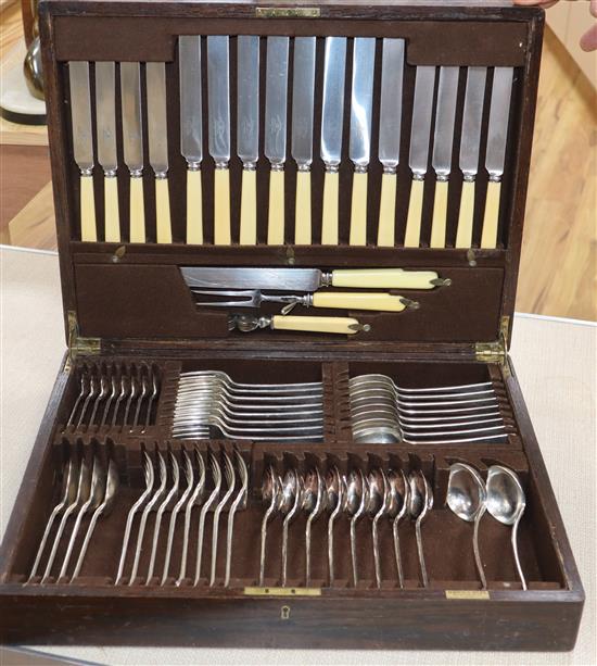 A Mappin & Webb service of plated flatware in oak canteen (setting for eight)
